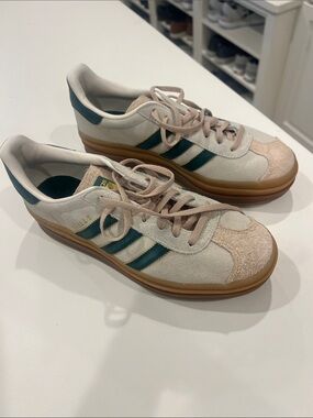 adidas Women’s Gazelle cream Suede Sneakers with Dark Green Stripes and Gum Sole